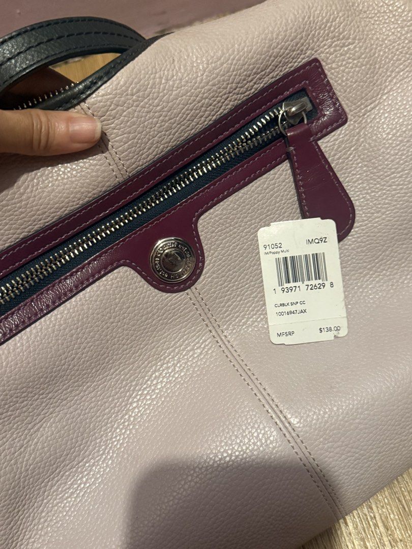 Coach Multi-Color Leather Shoulder Bag (Category: Luxury Bags & Wallets) located in Pasig City. Submitted by sea321 (Listing ID 1470941585, Image 3). Description: - Brand: Coach - Style Number: F15148 - Condition: Brand new with original $138 retail tag attached - Material: Soft milled cowhide leather - Colorway: Soft pinkish main body with dark trim and burgundy accents - Interior: Blue fabric lining with multiple pockets for organization - Exte
