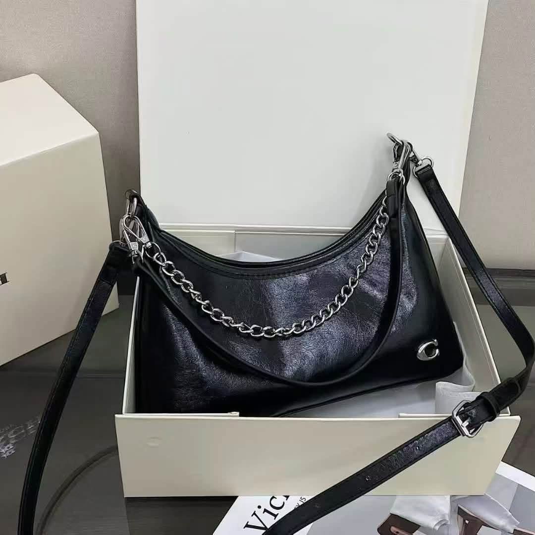 Coach Shoulder Bag (Category: Luxury Bags & Wallets) located in Paranaque City. Submitted by mmacita (Listing ID 1471061401, Image 3). Description: Includes box, dustbag, authentication card What you see is what you actually get. ₱899 only 1pc only.