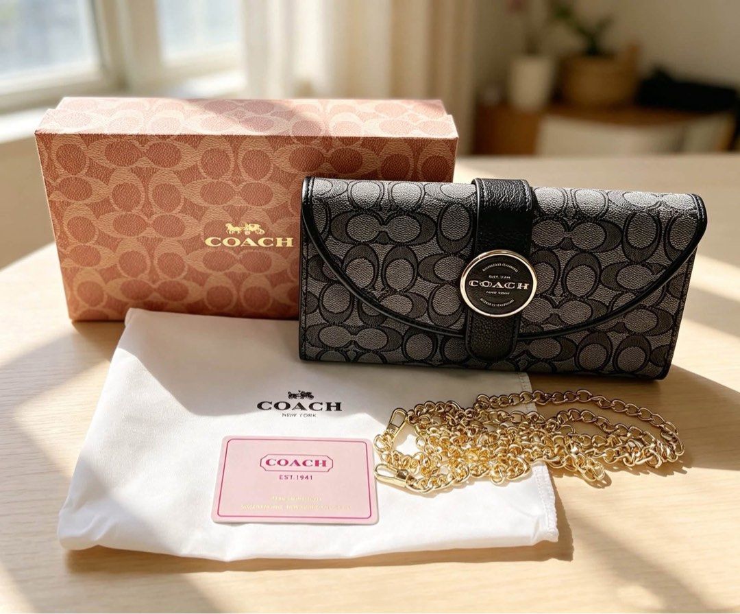 Coach Wallet / sling (Category: Luxury Bags & Wallets) located in Paranaque City. Submitted by mmacita (Listing ID 1471060923, Image 2). Description: Complete with authentication card, box and dust bag.