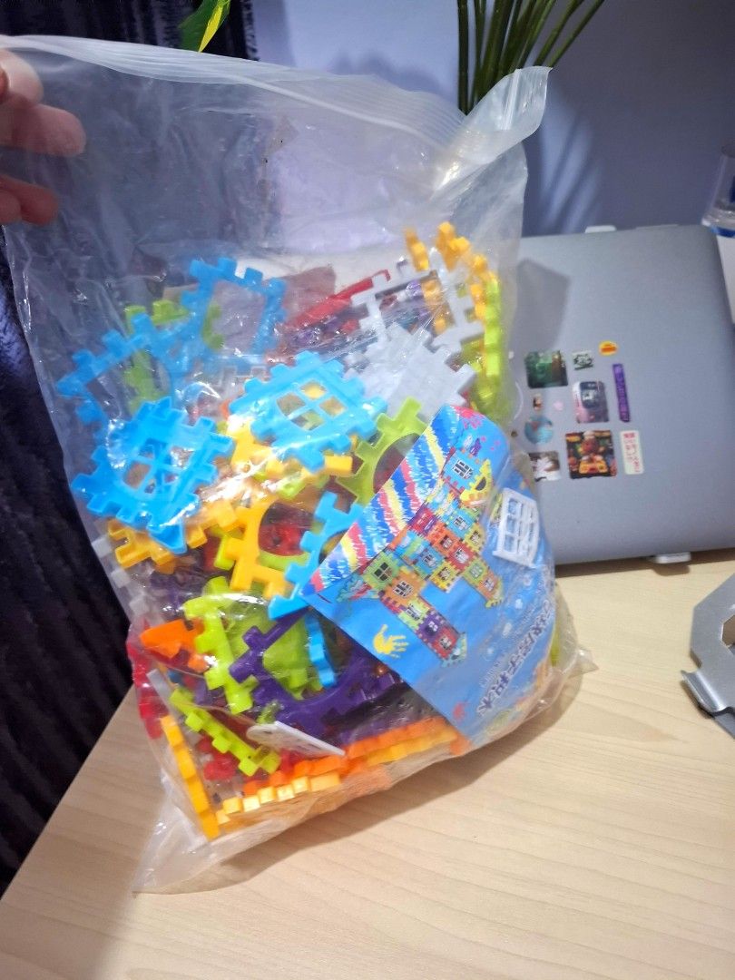 Colorful interlocking castle building blocks toy set with house design (Category: Lego & Building Sets) located in Quezon City. Submitted by ana-chan (Listing ID 1471046892, Image 2). Description: - Vibrant building blocks set with yellow, blue, red, green, and orange pieces - Pieces easily snap together to build houses and castles - Includes special window and roof pieces for realistic building - Great for encouraging kids' creativity and imagin