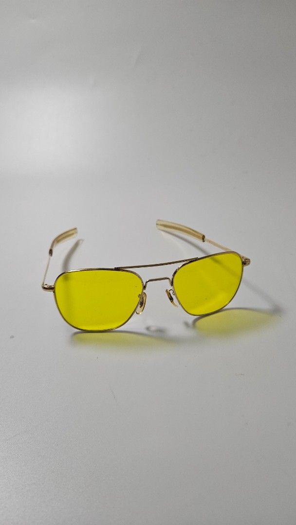 Command USA 23K Gold Aviator Sunglasses (Category: Sunglasses & Eyewear) located in Alfonso. Submitted by jbcamet (Listing ID 1471058451, Image 1). Description: - Brand: Command USA vintage aviator sunglasses - Details: Stamped 23K on the temple arm - Lenses: Bright yellow lenses - Frame: Classic wire frame with double brow bar design - Condition: Clean metal finish, comfortable nose pads intact, and clear protective coating on temple tips - Styl