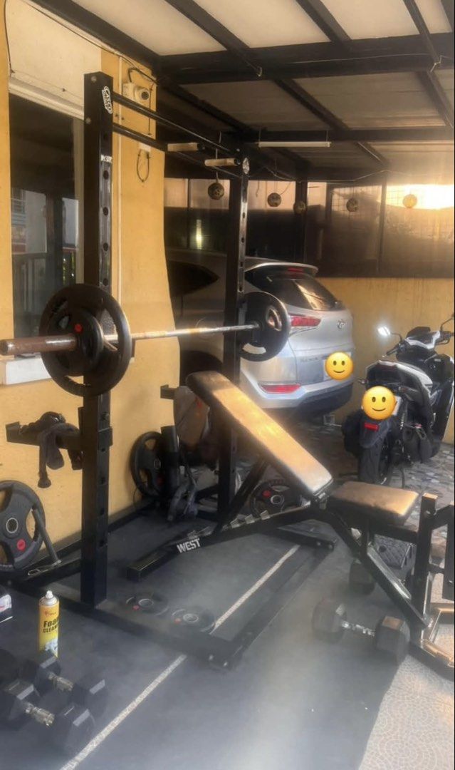 Complete Home Gym Squat Rack Bench Barbell Weight Set (Category: Weights & Dumbbells) located in Dasmarinas. Submitted by spidey_thrift (Listing ID 1470968535, Image 1). Description: Complete Home Gym Setup - Ready for heavy workouts and serious lifting - Heavy-duty power rack with integrated pull-up bar - Sturdy adjustable bench and standard barbell with collars - Rubber grip weight plates: 20kg, 10kg, 5kg, and 2.5kg pairs - Powergrab cast iron 