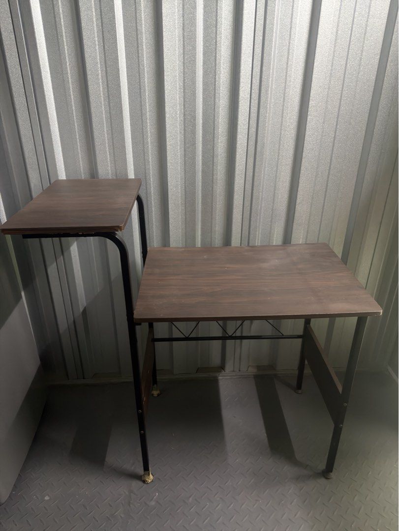 Computer table (Category: Tables & Sets) located in Consolacion. Submitted by wnpia (Listing ID 1471096421, Image 2). Description: - Dark wood grain laminate top and upper shelf - Sturdy black metal legs and crossbar support - Compact footprint, ideal for tight spaces - Upper tier perfect for holding a monitor or printer.