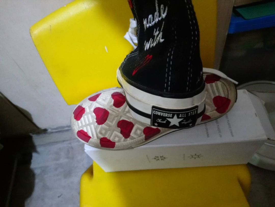 Converse Chuck Taylor All Star Made With Love (Category: Sneakers) located in Pasig City. Submitted by in2vintagestuffs (Listing ID 1470987214, Image 3). Description: - Brand: Converse - Style: High-top sneakers in classic black (for KIDS) - Details: Embroidered red heart details and 'made with love' text on outer panels - Features: White laces, white rubber toe caps, and iconic All Star ankle patch - Condition: Excellent, clean canvas material.