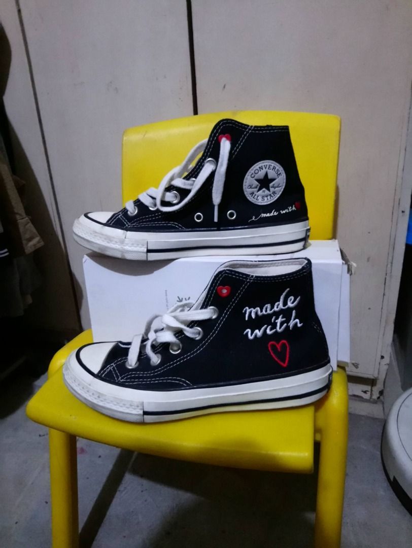 Converse Chuck Taylor All Star Made With Love (Category: Sneakers) located in Pasig City. Submitted by in2vintagestuffs (Listing ID 1470987214, Image 2). Description: - Brand: Converse - Style: High-top sneakers in classic black (for KIDS) - Details: Embroidered red heart details and 'made with love' text on outer panels - Features: White laces, white rubber toe caps, and iconic All Star ankle patch - Condition: Excellent, clean canvas material.