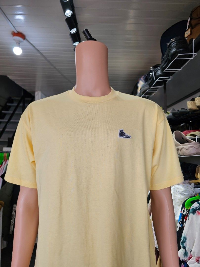 Converse Chuck Taylor Shoe Patch T-Shirt (Category: Tshirts & Polo Shirts ) located in Baguio. Submitted by kayeonlineshop (Listing ID 1471025489, Image 2). Description: Converse Chuck Taylor Shoe Patch T-Shirt in yellow, featuring a small Chuck Taylor high-top sneaker embroidery on the left chest..