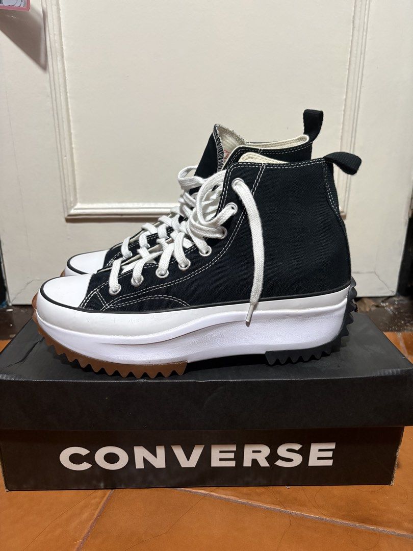Converse Run Star Hike High Top (Category: Sneakers) located in Cavite. Submitted by karessespieces (Listing ID 1470974760, Image 2). Description: - Authentic Converse Run Star Hike High Top sneakers - Color: Classic Black and White canvas - Bold chunky platform midsole with iconic jagged gum rubber tread - Details: White laces, metal eyelets, black heel loops, and inner tongue Chuck Taylor patch branding - Includes original black Converse shoebo