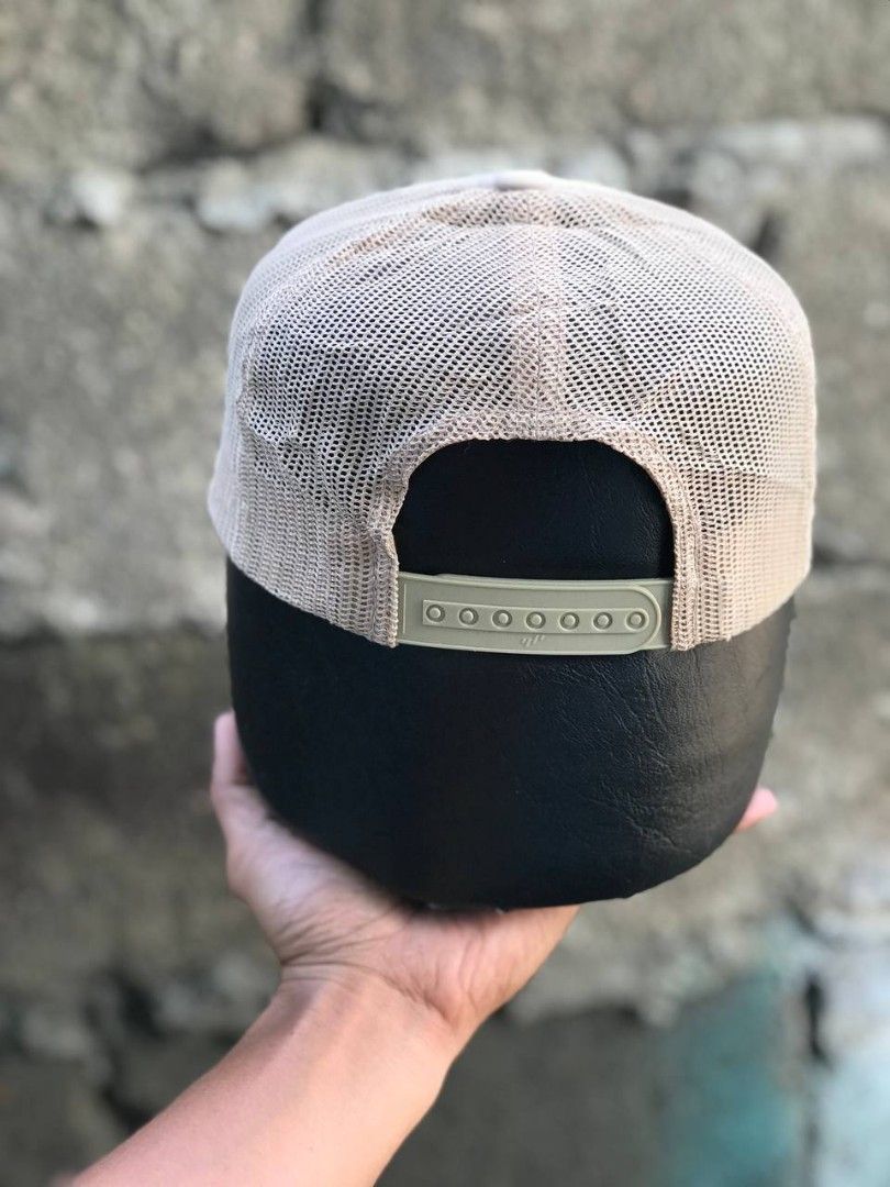 Cotopaxi Yupoong The Classics Snapback Hat Beige (Category: Caps & Hats) located in Manila. Submitted by jowiegarci63146 (Listing ID 1471073994, Image 3). Description: Cotopaxi trucker hat in beige. Yupoong The Classics tag inside. Snapback closure at the back, fully adjustable. Mesh back panels for ventilation. Red logo patch on the front crown. Cotton, polyester, and nylon blend material. Made in Vietnam..