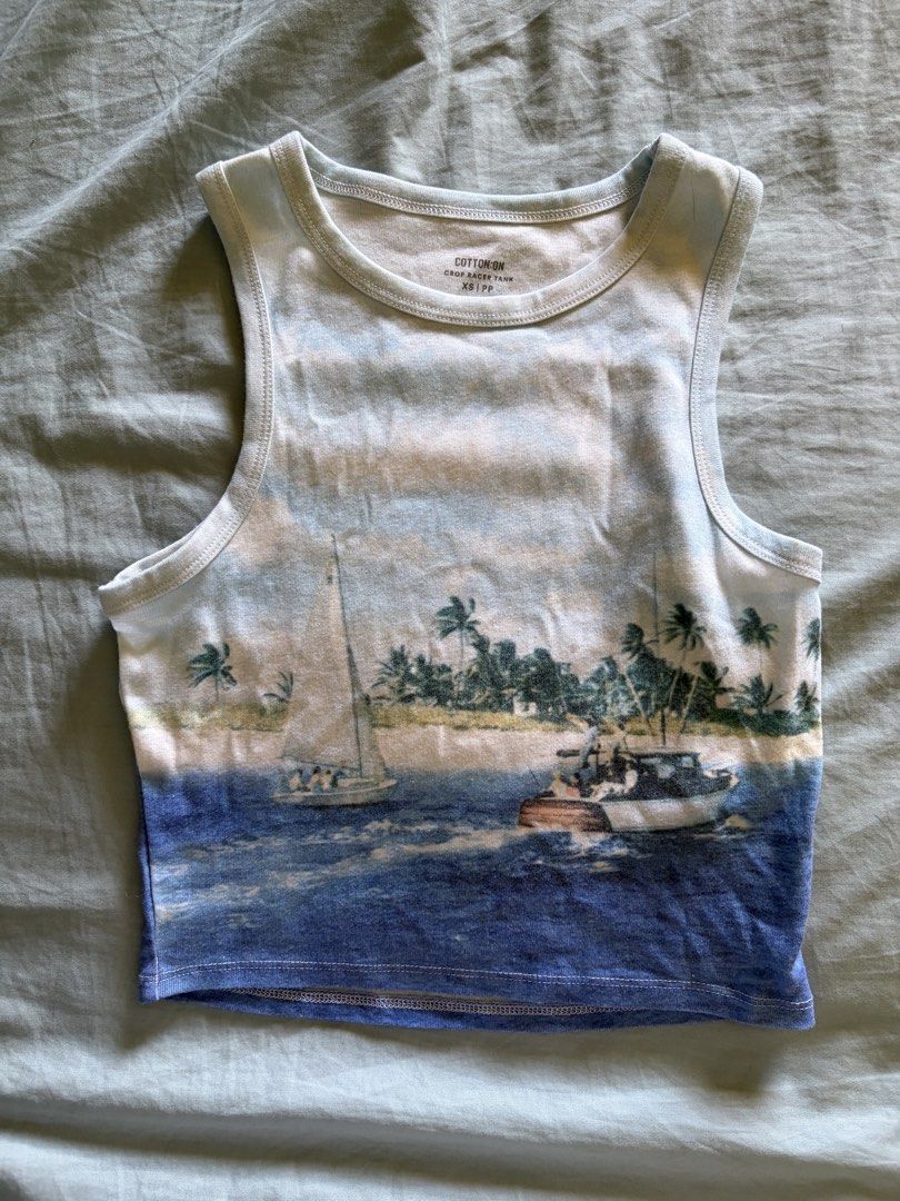 Cotton On Beach Racerback Top (Category: Sleeveless) located in Manila. Submitted by juliaespiritu_ (Listing ID 1470973729, Image 1). Description: In good condition .