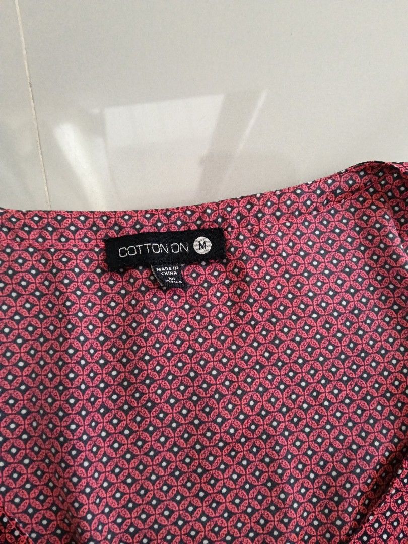 Cotton On Pink Patterned Sleeveless Dress Size M (Category: Dresses) located in Manila. Submitted by zenbear_6b2d8a (Listing ID 1470939736, Image 2). Description: - Brand: Cotton On - Size: M (fits true to size) - Color & Pattern: Pink with all-over small geometric print - Design: Sleeveless, scoop neckline, and fitted waist with gentle gathering - Material: Lightweight and breathable, ideal for warm weather - Condition: Excellent, ready to wear 