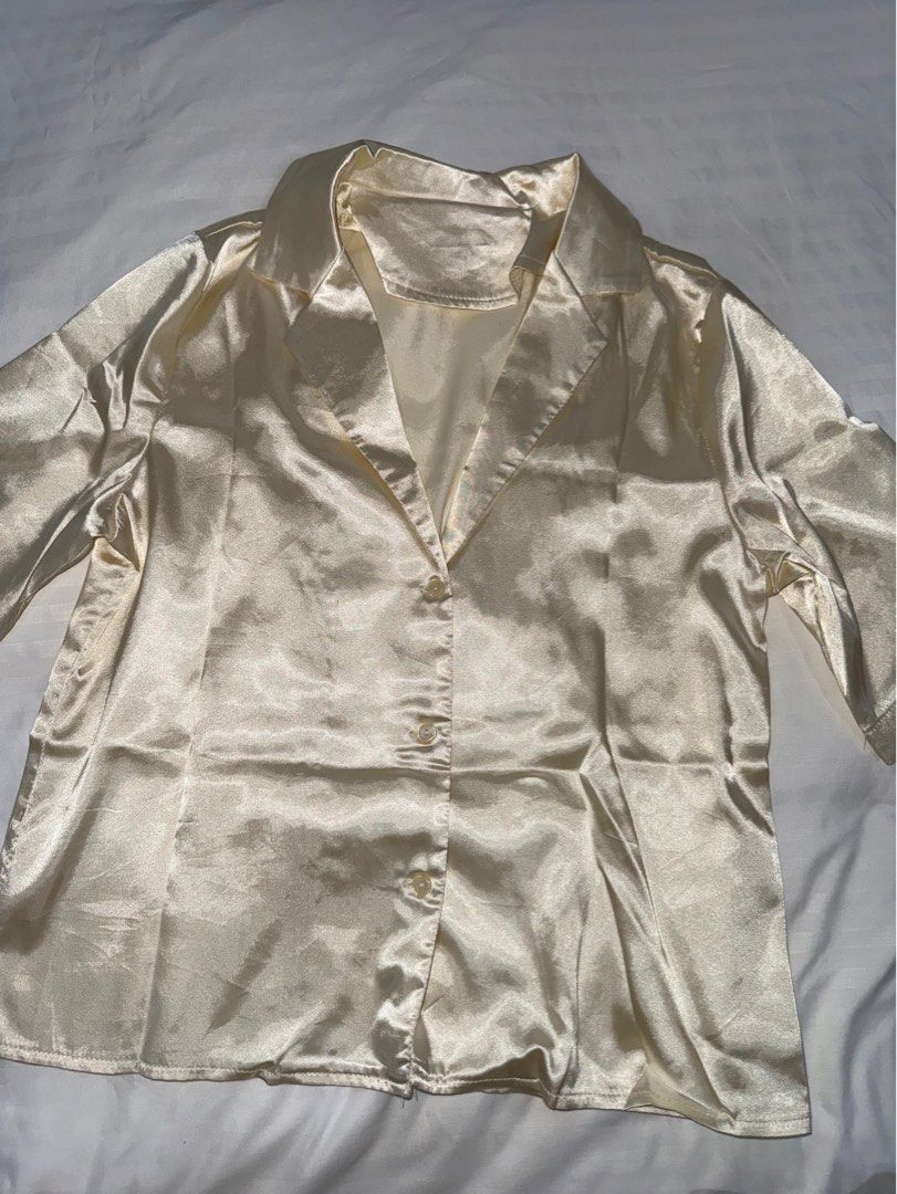 Cream Silk Button Up Long Sleeve Blouse (Category: Blouses) located in San Mateo. Submitted by cheeetosjalapeno (Listing ID 1471006882, Image 1). Description: ✨DECLUTTERING SALE✨ Condition: USED ONCE Location: San Mateo, Rizal - Color: Cream - Material: Silky smooth fabric with a subtle sheen - Style: Long sleeves, classic collar, front button-up with matching plastic buttons - Condition: Clean, no stains or pulled threads - Versatility: Great ba