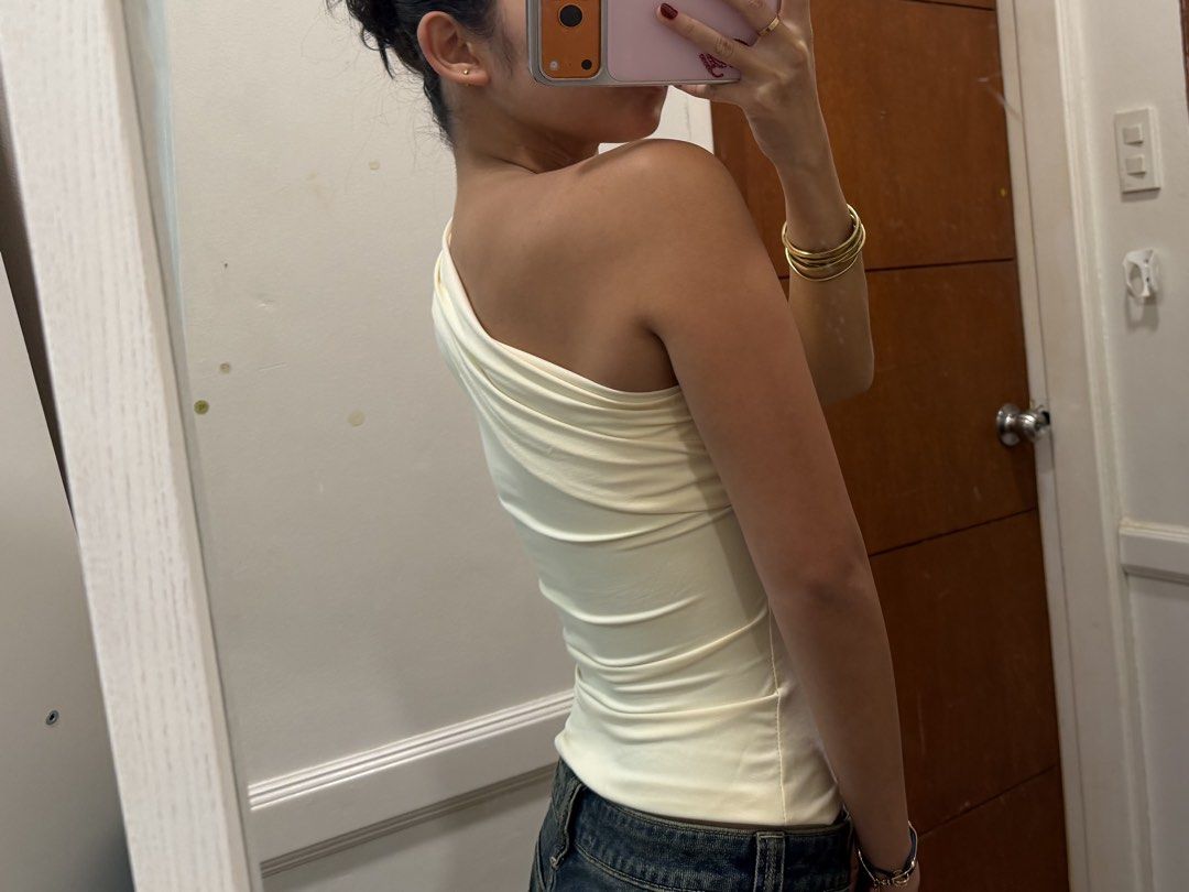 Crème one shoulder top (Category: Others Tops) located in Manila. Submitted by beysclosett (Listing ID 1471042970, Image 3). Description: - never used - good condition - fabric is stretchy and soft .