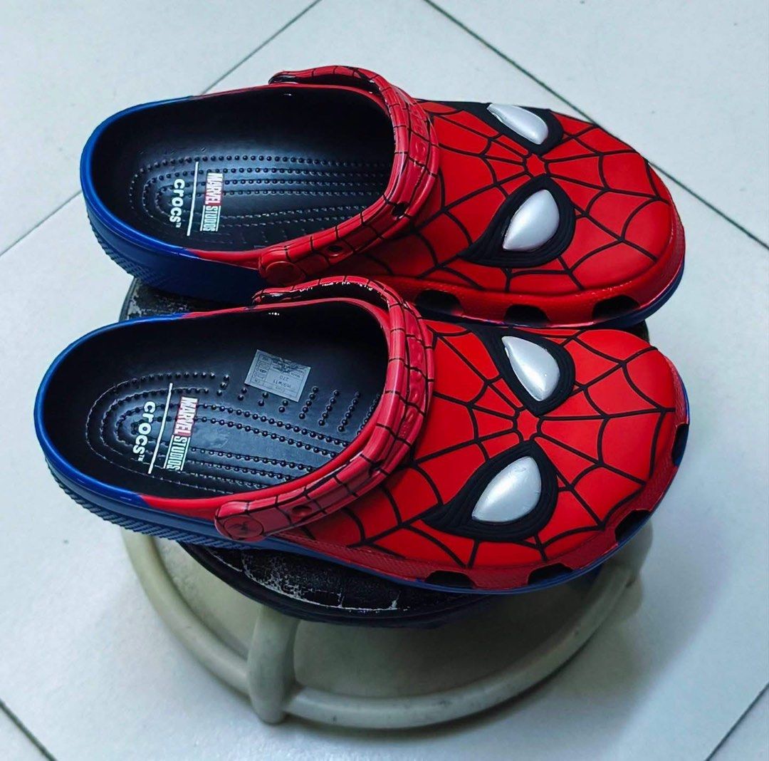Crocs Classic X Marvel ‘Spiderman’ (Category: Slippers & Slides) located in Manila. Submitted by collectorfinds (Listing ID 1471028740, Image 3). Description: “SUIT UP. STAND OUT.” 🕷️🕸️ Crocs Classic X Marvel ‘Spiderman’ Men’s US Size 7 / 8 For Only ✅ ₱ 6,895 📩 PM us to purchase 📍2nd Floor, 317 Fernando Poe Jr Ave . Quezon City. Right above Yamaha near LRT 1 - Roosevelt Station. 📈 Prices subject to change without notice.