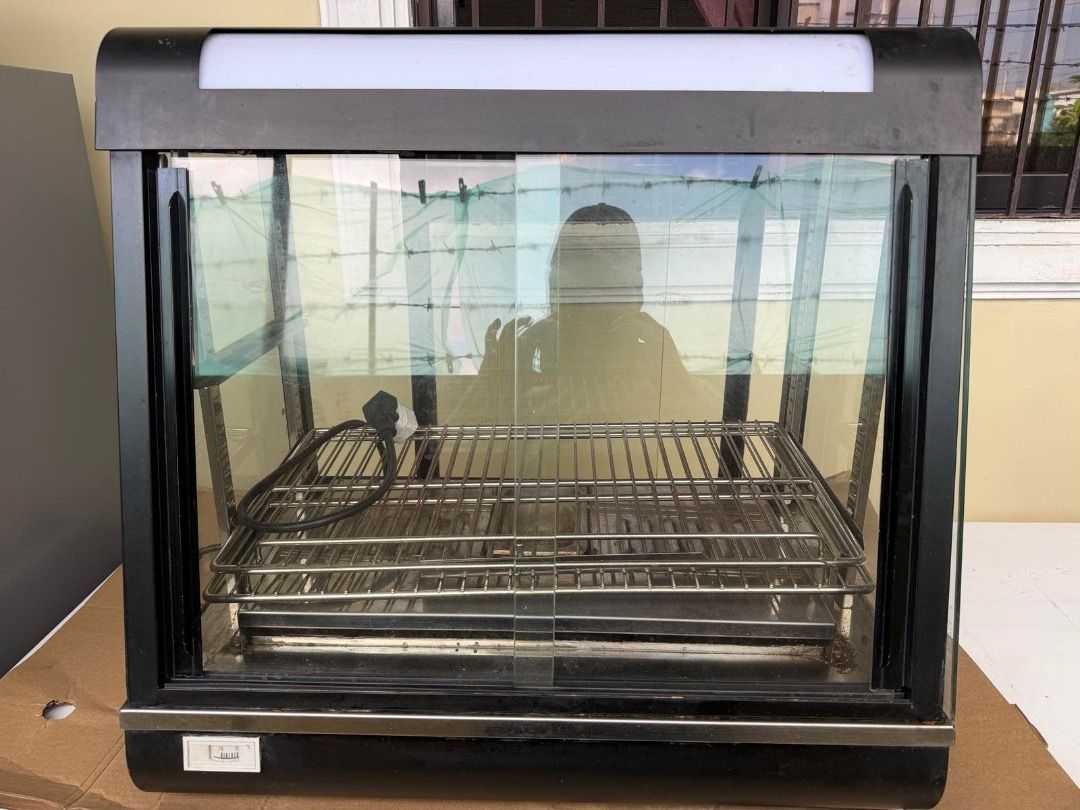 CT Concepts R60-2 Food Warmer Display (Category: Food Organization & Storage) located in Caloocan City. Submitted by brightdolphin_bfc4c6 (Listing ID 1471014235, Image 2). Description: CT Concepts R60-2 Food Warmer Display Cabinet for sale - Heavy-duty commercial unit with a sleek black base and top housing - Multi-tier wire shelving setup enclosed in glass doors for maximum visibility - Features an integrated lighting panel to showcase your food