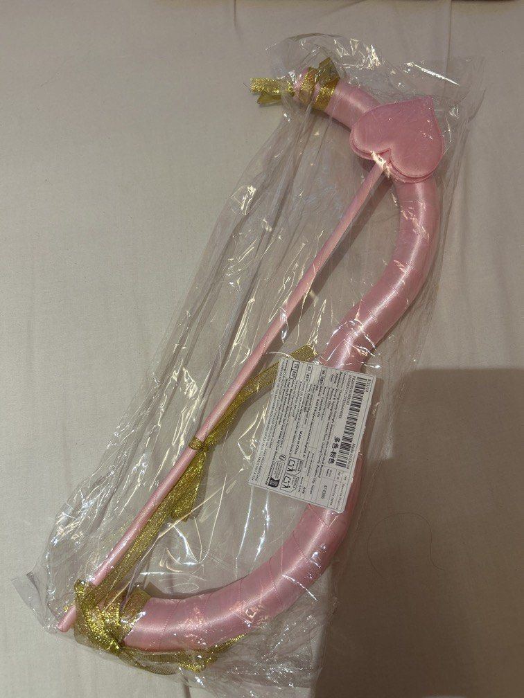 Cupid bow and arrow (Category: Accessory Holder, Box & Organizers) located in Manila. Submitted by coquettecosette (Listing ID 1470956178, Image 1). Description: Brand new cupids bow and arrow perfect for halloween costume💗.