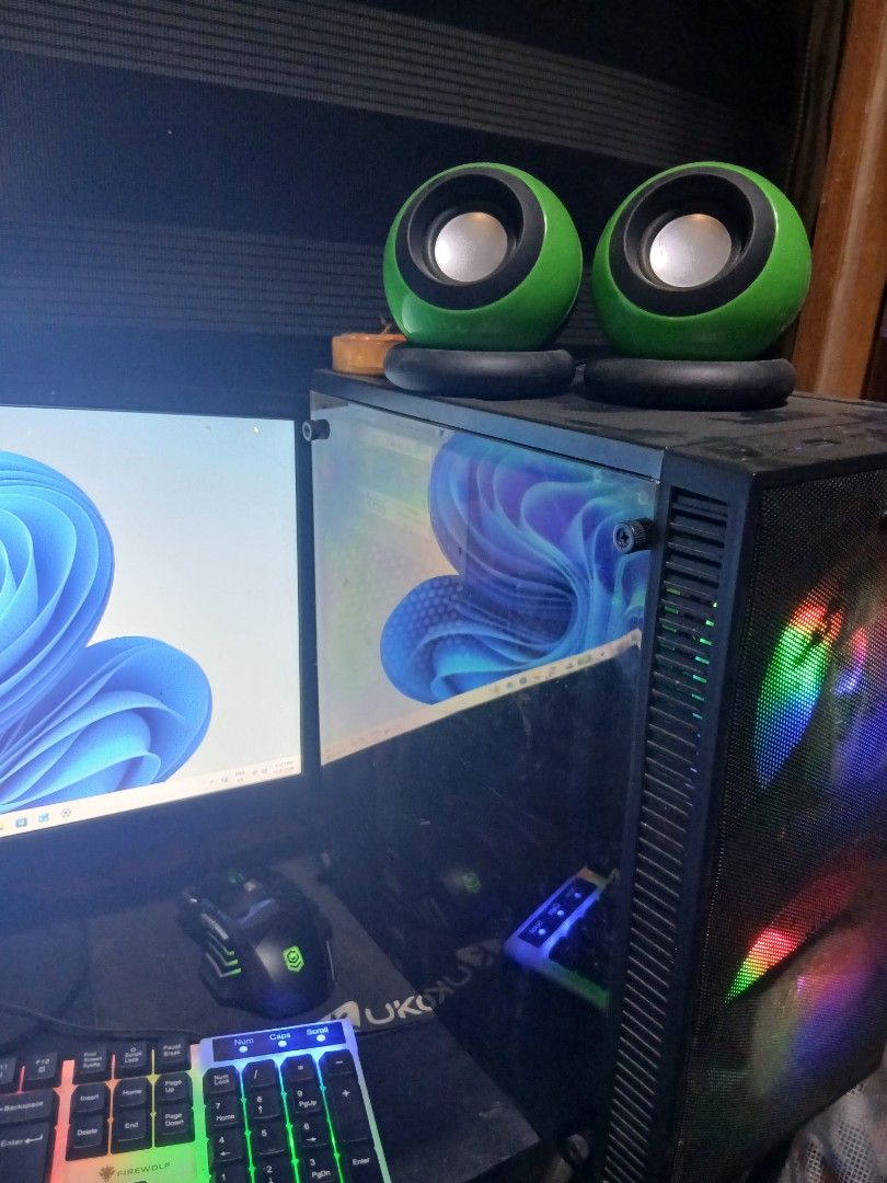 Custom Gaming PC Setup with AMD A12 and GTX 750 Ti (Category: Desktops) located in Manila. Submitted by jhovernash69413 (Listing ID 1471076544, Image 3). Description: - Complete plug-and-play gaming setup with Windows 11 installed - AMD A12-9800 processor and 12GB RAM for smooth daily use and gaming - NVIDIA GeForce GTX 750 Ti (2GB) graphics card - 119GB storage capacity - Stylish case with multi-color RGB front mesh fans and a glass side window 