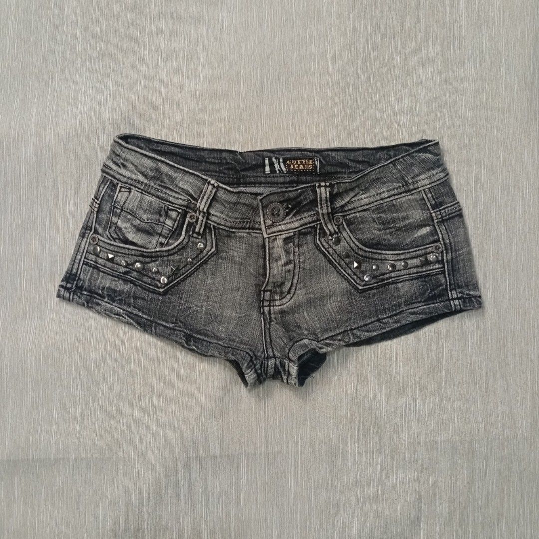Cuttle Jeans dark wash studded denim shorts (Category: Shorts) located in Tagum. Submitted by virgosattic.111 (Listing ID 1470958085, Image 2). Description: - flat measurement: 27.5 - Brand: Cuttle Jeans - Wash: Dark wash with acid wash finish - Details: Edgy stud accents on front and back pockets, custom hardware button fly - Fit: Mid-rise with classic five-pocket styling - Style: Perfect for summer days and festival outfits - Condition: Excelle