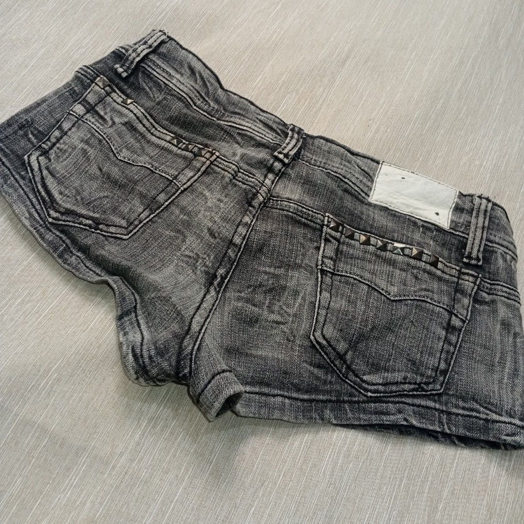 Cuttle Jeans dark wash studded denim shorts (Category: Shorts) located in Tagum. Submitted by virgosattic.111 (Listing ID 1470958085, Image 3). Description: - flat measurement: 27.5 - Brand: Cuttle Jeans - Wash: Dark wash with acid wash finish - Details: Edgy stud accents on front and back pockets, custom hardware button fly - Fit: Mid-rise with classic five-pocket styling - Style: Perfect for summer days and festival outfits - Condition: Excelle