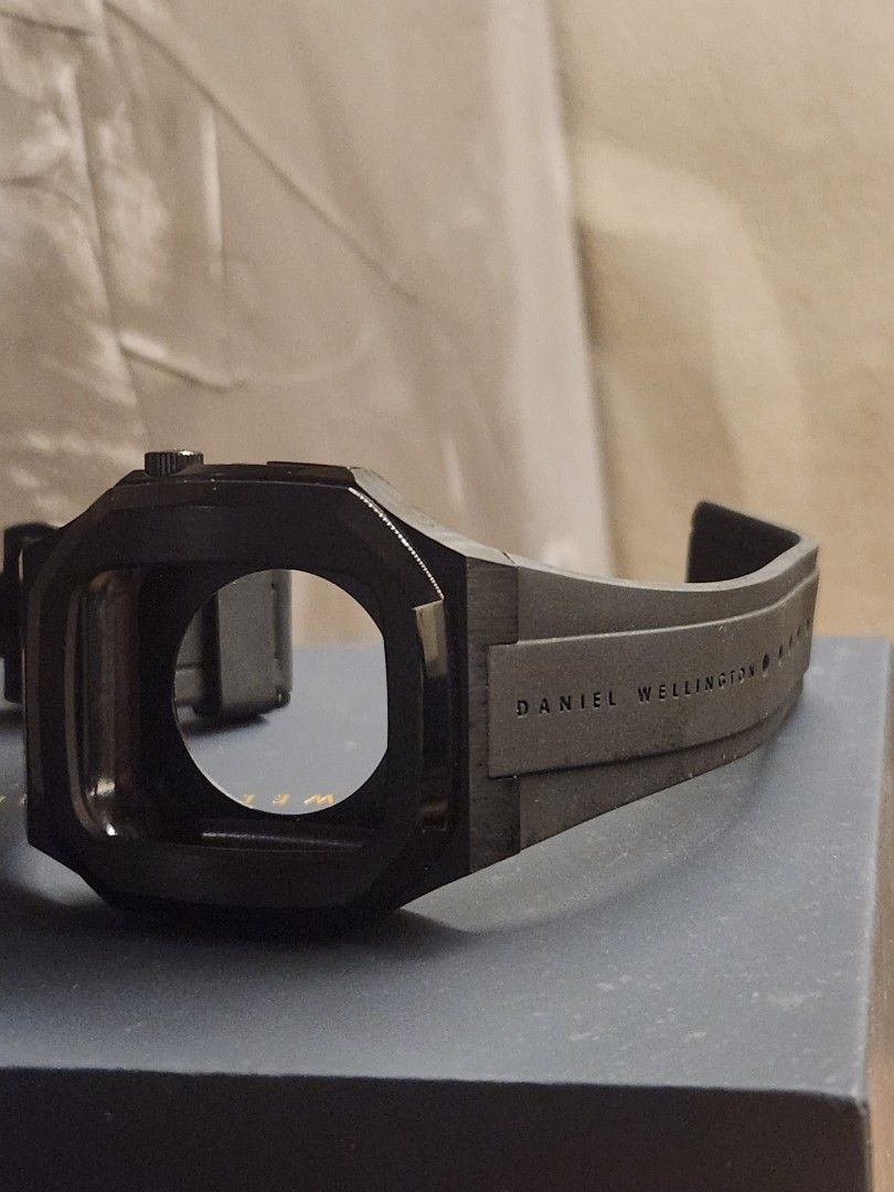 Daniel Wellington Switch Apple Watch Case Black (Category: Wearables & Smart Watches) located in Caloocan City. Submitted by noblestorm_c6463a (Listing ID 1471028687, Image 2). Description: - Matte black finish stainless steel housing transforms your Apple Watch into a bold square timepiece - Comfortable silicone rubber band ideal for daily wear - Comes complete with the original box and packaging - Great and easy way to switch up your everyday s