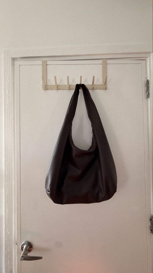 Large Aztrid Hobo Bag (Brown) (Category: Shoulder Bags) located in Taguig. Submitted by amarivera (Listing ID 1471004597, Image 2). Description: Large size, note slight chip in the leather and black mark but not that noticeable Rfs: not reaching for it anymore.