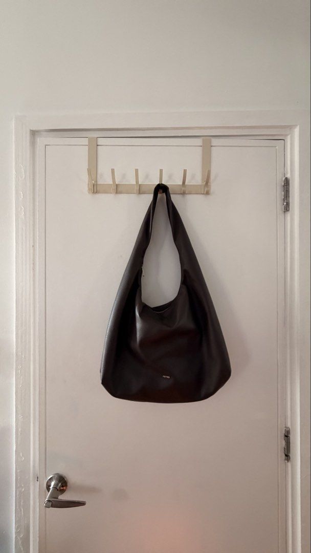 Large Aztrid Hobo Bag (Brown) (Category: Shoulder Bags) located in Taguig. Submitted by amarivera (Listing ID 1471004597, Image 1). Description: Large size, note slight chip in the leather and black mark but not that noticeable Rfs: not reaching for it anymore.