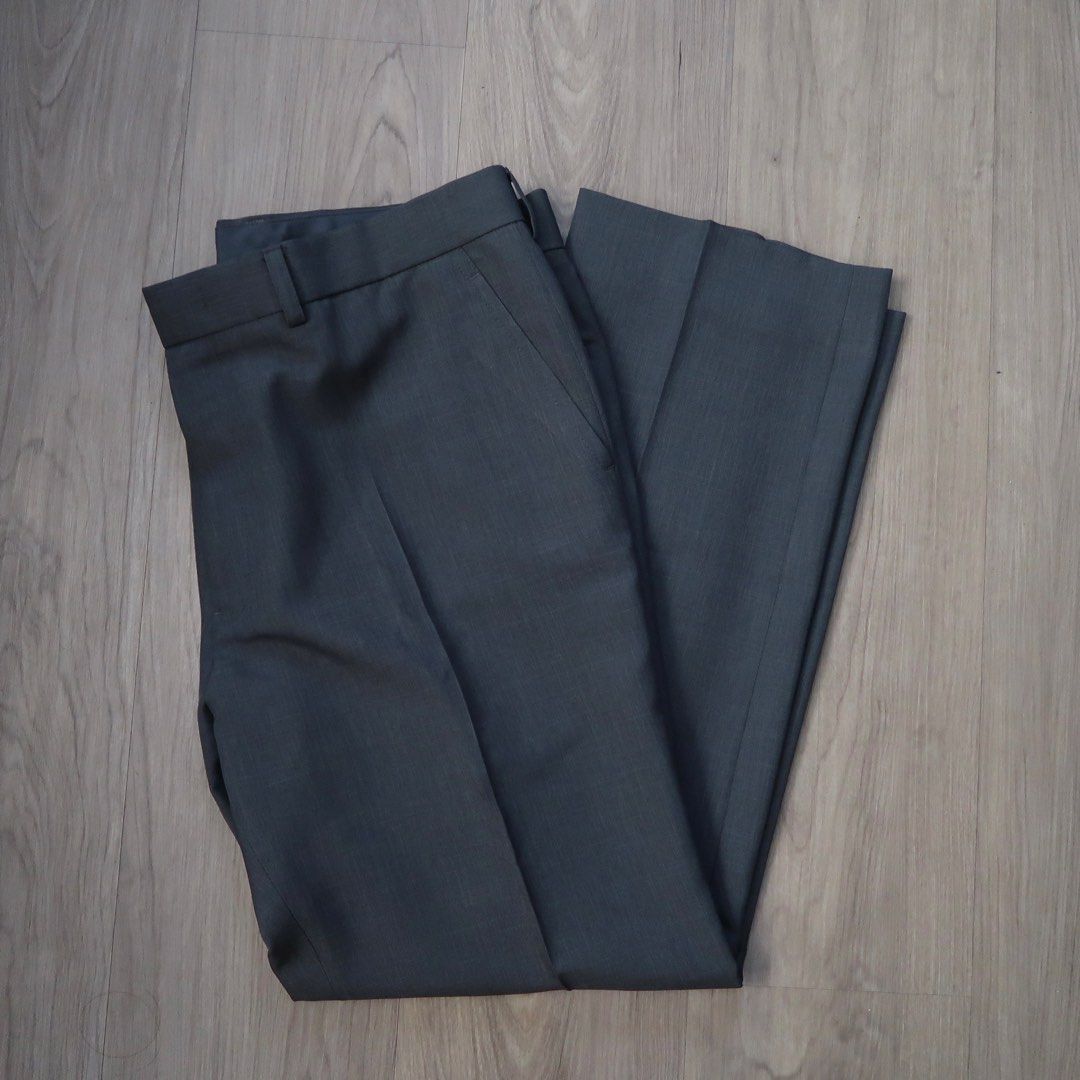 Dark Grey Formal Dress Trousers Slacks (Category: Trousers) located in Manila. Submitted by mixi_lexi (Listing ID 1471041619, Image 1). Description: - Color: Dark Grey - Fit: Classic tailored fit with center creases - Details: Belt loops and side slanted pockets - Closure: Standard button and zip fly at the front - Fabric: Clean with a smooth texture - Ideal for: Office wear or formal events.