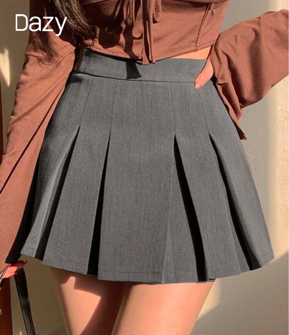 Dazy Grey Pleated Mini Skirt (Category: Skirts) located in Paranaque City. Submitted by sofiaveee (Listing ID 1471085075, Image 1). Description: - Brand: Dazy - Style: High-waisted pleated mini skirt - Color: Solid charcoal grey - Fit: Structured with sharp pleats and a short hemline - Vibe: Schoolgirl aesthetic, perfect for casual outfits - Pairing: Looks great with boots or sneakers RFS: Duplicate order Pm for actual photos.