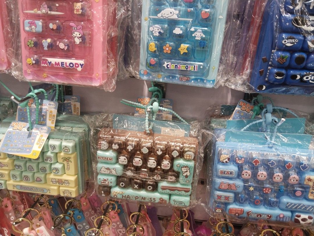 Decompression Grid Button Toy Keyboard Style (Category: Interactive Toys) located in Manila. Submitted by neojamesca55018 (Listing ID 1471084771, Image 3). Description: - Condition: Brand new in original packaging - Designs: Cute miniature keyboards and snack packs (Oreo, Lay's, Kitty, My Melody) - Purpose: Great for stress relief and fidgeting - Variety: Multiple colors and themes available - Perfect as a gift or cute accessory!.