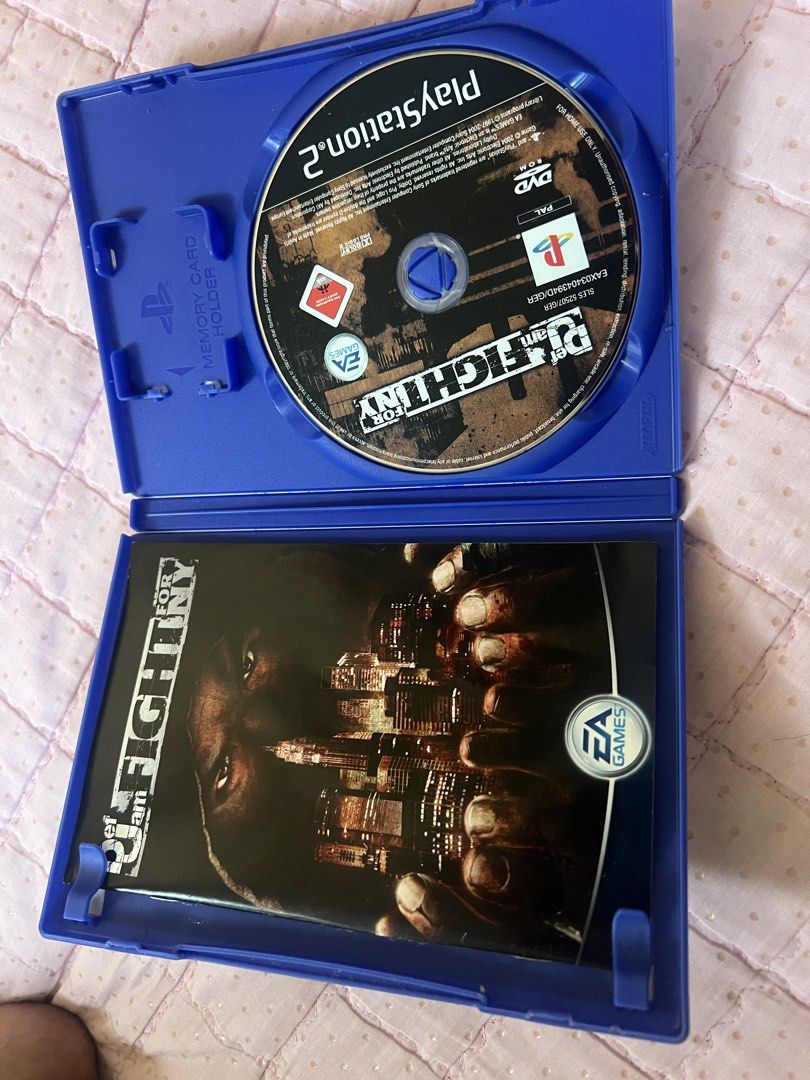 Def Jam Fight For NY PlayStation 2 PS2 Game (Category: PlayStation) located in Panabo. Submitted by rtano (Listing ID 1470979356, Image 2). Description: - Game: Def Jam Fight For NY - Platform: PlayStation 2 (PAL region) - Included: Original blue case, game disc, and manual insert - Condition: Case has minor storage wear; disc is clean and tested - Genre: Classic hip-hop fighting game - Ideal for: Retro gaming collectors and fans.