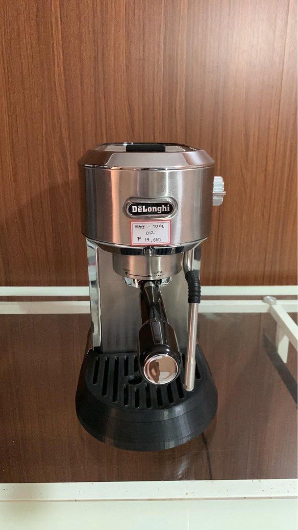 DeLonghi Dedica maestro Espresso Machine (Category: Coffee Machines & Makers) located in Pulilan. Submitted by sebbii (Listing ID 1470960525, Image 1). Description: - Stainless steel body with a space-saving compact footprint - Includes group handle, portafilter, and built-in steam wand for milk frothing - Removable drip tray for quick and easy cleaning - Great addition to any coffee lover's countertop.