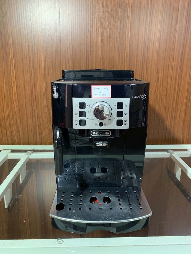 DeLonghi Magnifica S Espresso Coffee Machine Black (Category: Coffee Machines & Makers) located in Pulilan. Submitted by sebbii (Listing ID 1470959997, Image 3). Description: - Model: DeLonghi Magnifica S bean-to-cup coffee machine - Color: Sleek black with a silver control panel - Features: Rotary dial for coffee strength, push buttons for cup sizes, and built-in steam wand for milk frothing - Condition: Powers up and works smoothly, thoroughly 