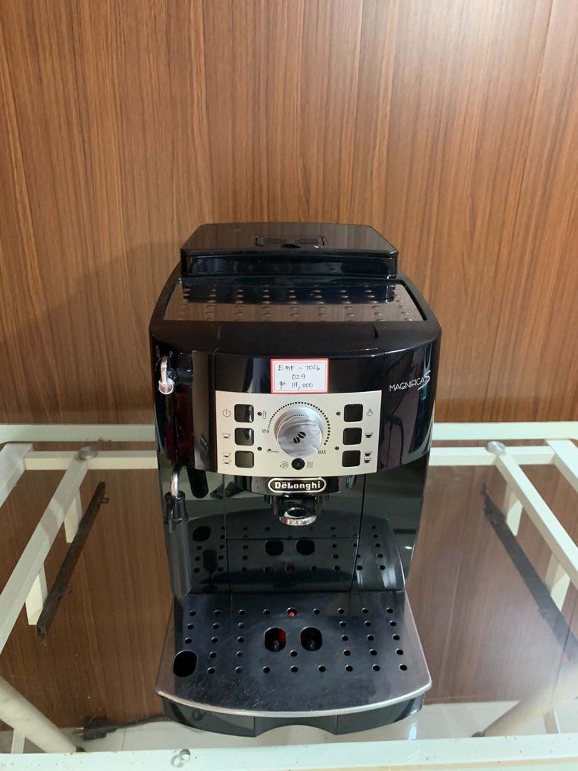 DeLonghi Magnifica S Espresso Coffee Machine Black (Category: Coffee Machines & Makers) located in Pulilan. Submitted by sebbii (Listing ID 1470959997, Image 1). Description: - Model: DeLonghi Magnifica S bean-to-cup coffee machine - Color: Sleek black with a silver control panel - Features: Rotary dial for coffee strength, push buttons for cup sizes, and built-in steam wand for milk frothing - Condition: Powers up and works smoothly, thoroughly 