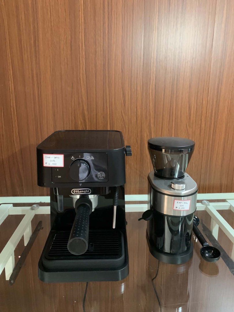 Delonghi stilosa Espresso Machine and Coffee Grinder Set (Category: Coffee Machines & Makers) located in Pulilan. Submitted by sebbii (Listing ID 1470962316, Image 1). Description: - Complete home coffee setup: DeLonghi espresso machine and matching electric grinder - Includes portafilter, drip tray, clear-hopper grinder, and black coffee scoop - Tested and working properly - Sleek black design with silver accents - Ready for your daily morning r