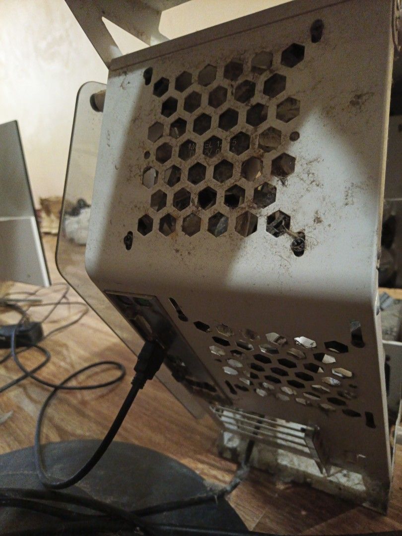 Defective Desktop Gaming PC (Category: Desktops) located in Tanza. Submitted by raphgex15 (Listing ID 1470956315, Image 3). Description: RUSH!!! - Custom white gaming PC case for DIY builders - Features front panel graphics and top I/O ports with USB - Condition: Heavy dust and grime; requires cleaning - Sold as-is, great restoration project Selling this defective PC, which I believe can still be fixed. I bought this 3 years ago for 19k. It just 