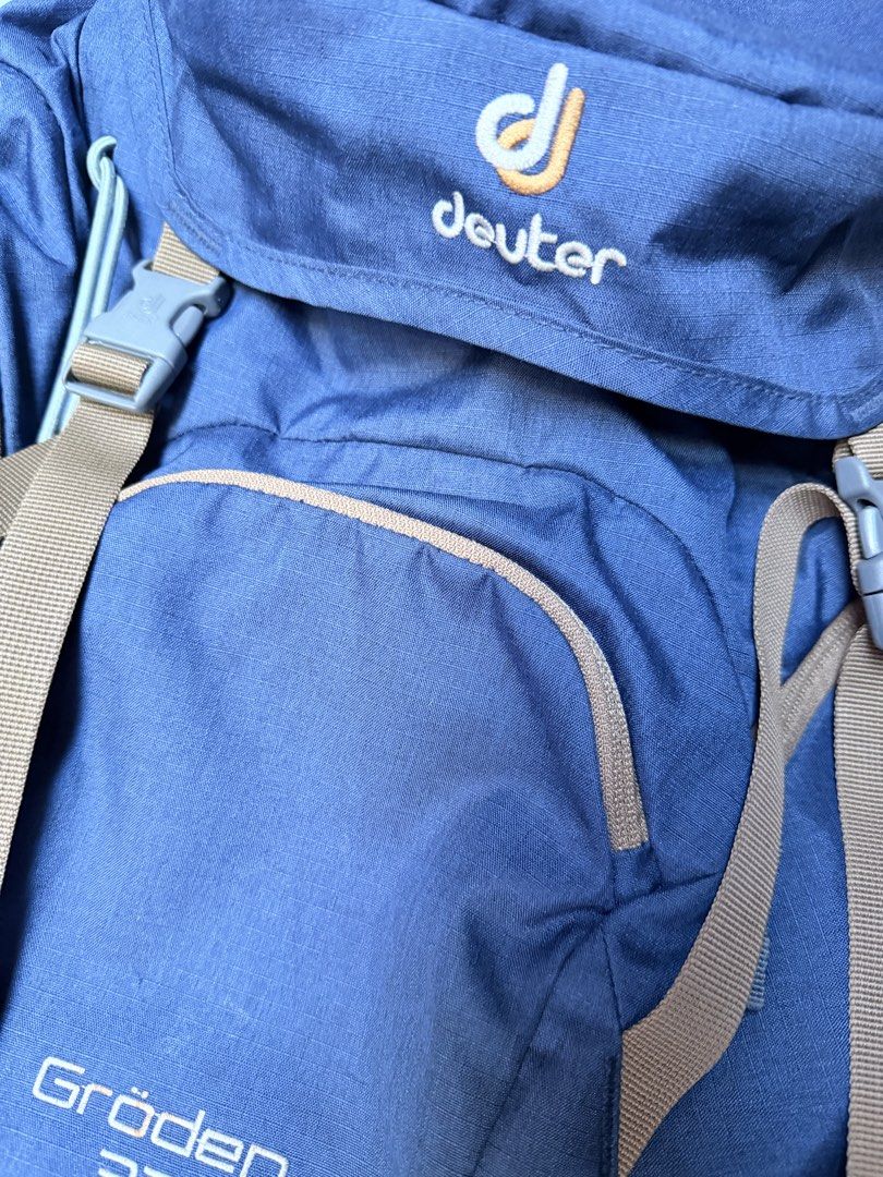 Deuter Groden 32 Hiking Backpack Blue Brown (Category: Backpacks) located in Manila. Submitted by erin_closet (Listing ID 1471012377, Image 2). Description: Deuter Gröden 32 hiking backpack in blue and brown colorway. Aircontact mesh back system keeps airflow steady while carrying. Multiple zippered compartments and top lid pocket for gear storage. Adjustable padded shoulder straps with sternum strap and hip belt. Integrated rain cover included a