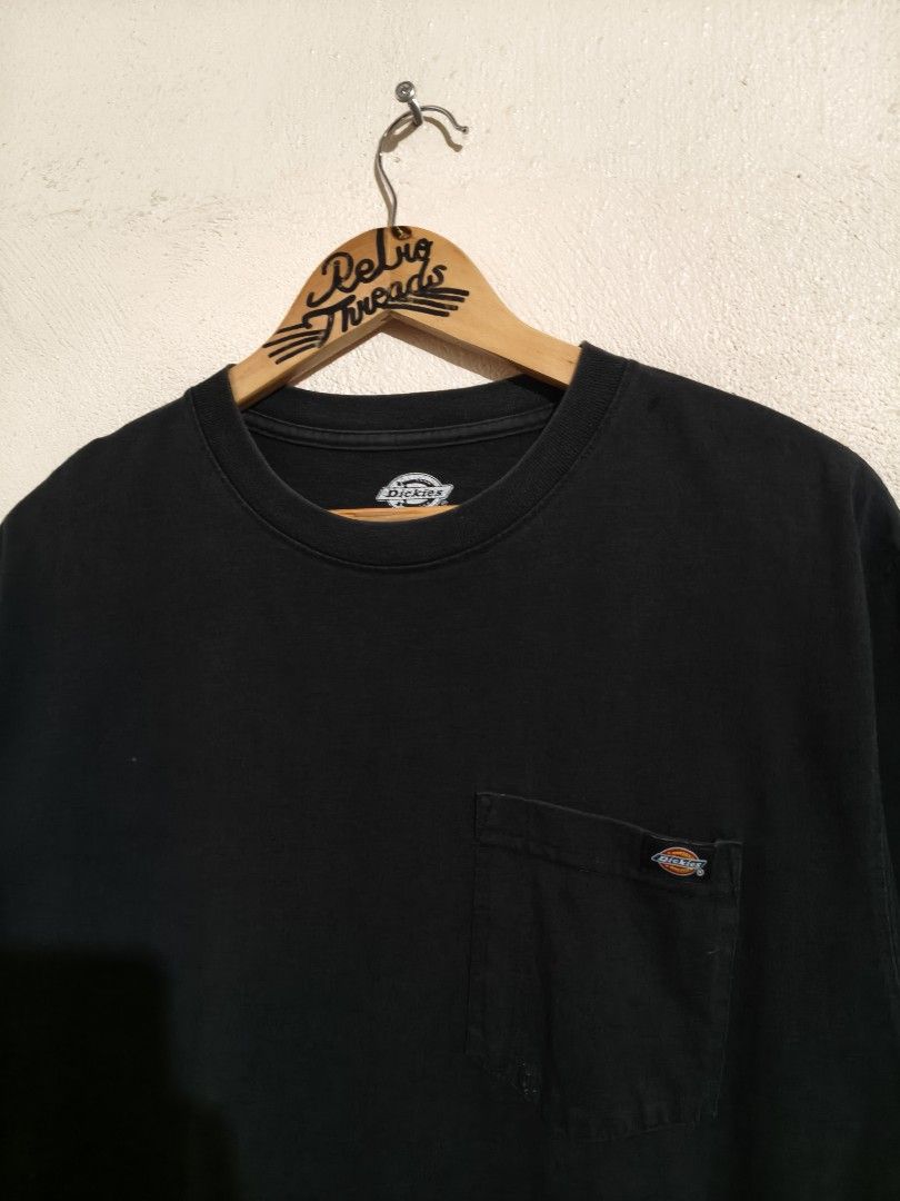 Dickies Black Pocket T-Shirt Medium (Category: Tshirts & Polo Shirts ) located in Siquijor. Submitted by retrothreads-r18 (Listing ID 1470941230, Image 2). Description: - Brand: Dickies - Color: Classic Black - Size: M (Made in Mexico) - Material: 100% Cotton - Fit: Relaxed fit with short sleeves - Details: Single chest pocket with signature logo tag - Condition: Great everyday basic top for casual wear, easy to style with denim or shorts.