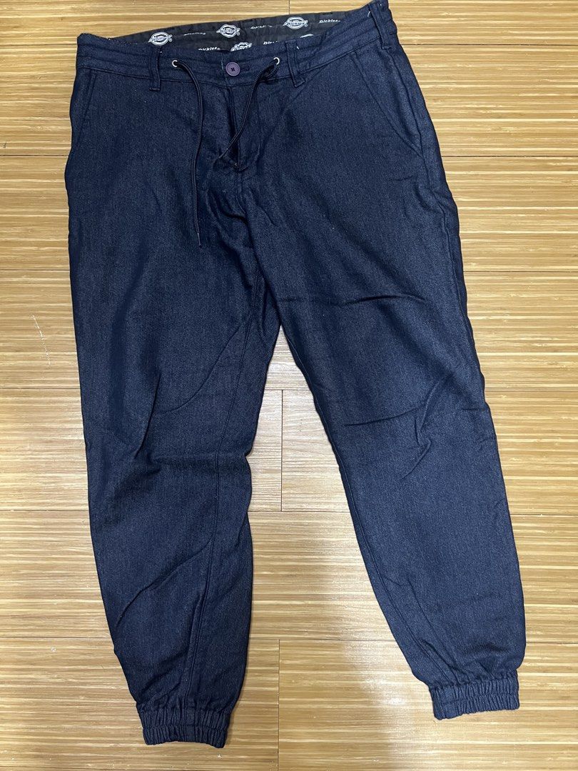 Dickies Jogger Pants Dark Blue Size 28 (Category: Joggers) located in Makati City. Submitted by immhace19 (Listing ID 1471061093, Image 1). Description: Dark blue Dickies jogger pants with elasticated ankle cuffs. Size 28, 160/70A. Drawstring waist with button closure. Branded inner waistband lining and classic red logo tag on the back pocket. Comfortable fit with cuffed bottoms. 300 PESOS ONLY.