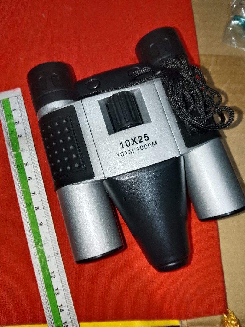 DigiCam Binoculars (Category: Travel Essentials & Accessories) located in Santo Tomas. Submitted by retrotastic (Listing ID 1471075045, Image 2). Description: unused✔️ 10x25 digital camera binocular SD card and battery not included Brandnew condition ₱600.