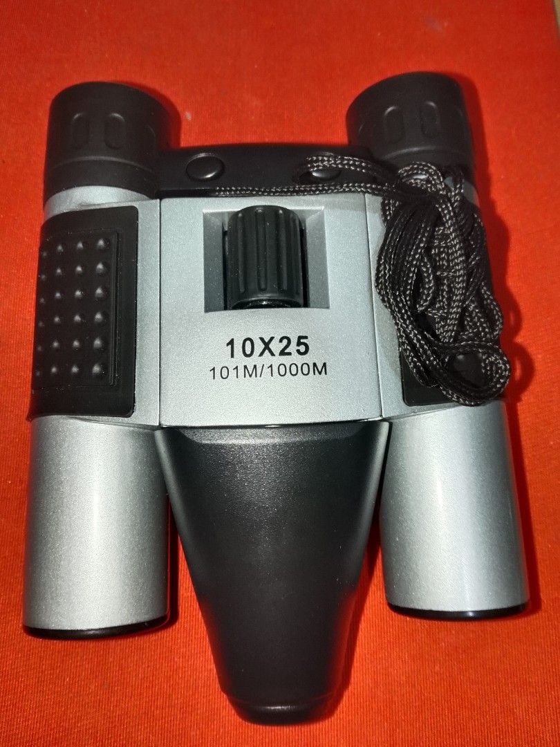 DigiCam Binoculars (Category: Travel Essentials & Accessories) located in Santo Tomas. Submitted by retrotastic (Listing ID 1471075045, Image 1). Description: unused✔️ 10x25 digital camera binocular SD card and battery not included Brandnew condition ₱600.
