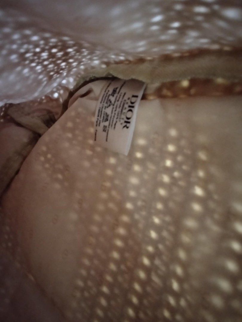 Dior Woven Straw Tote Bag (Category: Tote Bags) located in Butuan. Submitted by natalday (Listing ID 1470999142, Image 2). Description: - Color/Material: Beige woven straw texture - Design: Double shoulder handles with white embroidered Dior logo on the front - Interior: Spacious open-top design with official Dior Beauty tag - Versatility: Ideal for daily use, casual outings, or beach trips - Condition: Brand new/Excellent (Ready to ship).