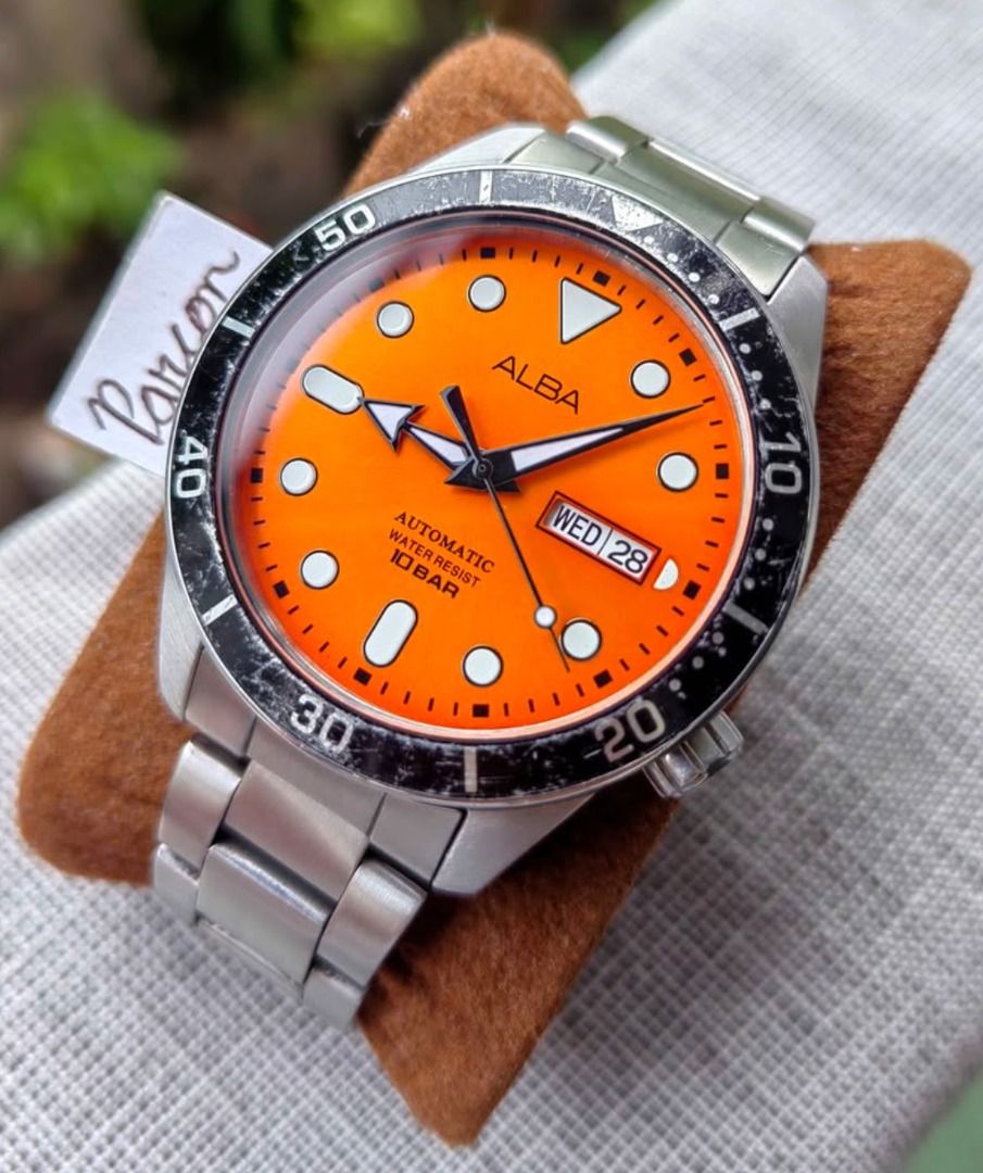 Discontinued! Seiko Alba Automatic *Orange Sunburst Dial* (Category: Men's Watches) located in Caloocan City. Submitted by preserve_timepieces (Listing ID 1470985454, Image 2). Description: -PLEASE READ THE DESCRIPTION. -Glass Condition: No Scratches. -All Original Watch. -Recently serviced movement. -With Timegrapher Picture. -Power Reserve: ~41 hours (when fully wound) -P4900+Shipping Fee -Brand: Seiko Alba -21 Jewels Automatic. -Case Width: 42