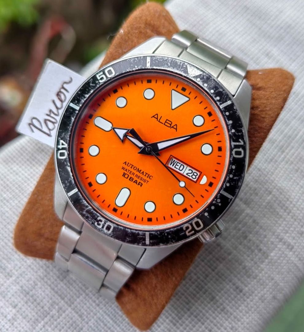 Discontinued! Seiko Alba Automatic *Orange Sunburst Dial* (Category: Men's Watches) located in Caloocan City. Submitted by preserve_timepieces (Listing ID 1470985454, Image 1). Description: -PLEASE READ THE DESCRIPTION. -Glass Condition: No Scratches. -All Original Watch. -Recently serviced movement. -With Timegrapher Picture. -Power Reserve: ~41 hours (when fully wound) -P4900+Shipping Fee -Brand: Seiko Alba -21 Jewels Automatic. -Case Width: 42