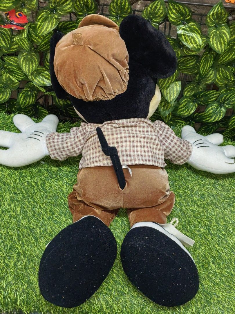 Disney Mickey Mouse plush toy in checkered jacket approx 55cm (Category: Plushies & Soft Toys) located in Paranaque City. Submitted by furugiyafinds (Listing ID 1471071806, Image 3). Description: 📌 Flaws last pic - Authentic Disney Mickey Mouse plush toy - Dressed in a stylish brown checkered jacket, vest, bow tie, and matching hat - Features iconic oversized white gloves, big plastic eyes, and a cute tail - Detailed with white fringe on the sho