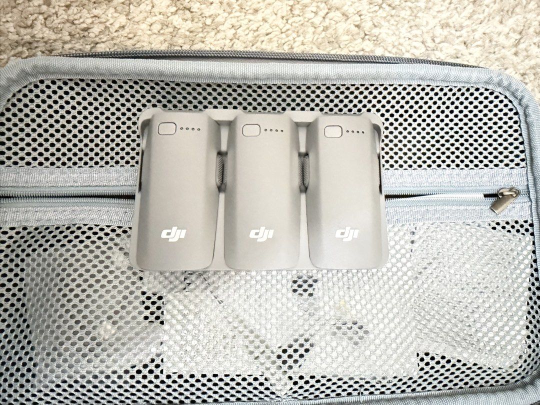 DJI Neo 2 Fly More Combo with Controller and Bag (Category: Drones) located in Quezon City. Submitted by nicoletted18798 (Listing ID 1471041300, Image 3). Description: - Complete DJI Neo drone set, perfect for quick flying trips - Includes DJI Neo drone and RC-N3 remote controller - Power-packed with 3 flight batteries and a charging hub - Comes with a stylish gray carrying case featuring a shoulder strap - Custom foam compartments keep everythin