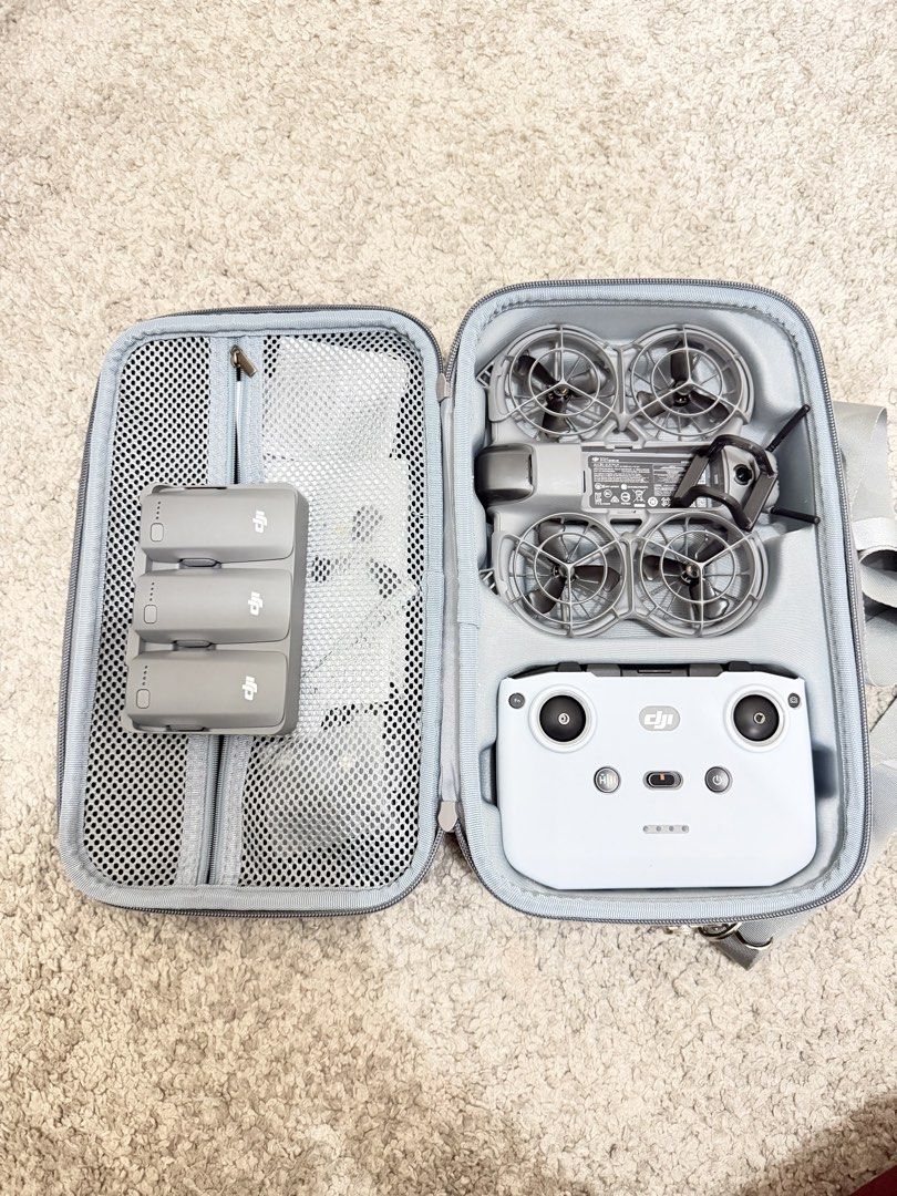 DJI Neo 2 Fly More Combo with Controller and Bag (Category: Drones) located in Quezon City. Submitted by nicoletted18798 (Listing ID 1471041300, Image 1). Description: - Complete DJI Neo drone set, perfect for quick flying trips - Includes DJI Neo drone and RC-N3 remote controller - Power-packed with 3 flight batteries and a charging hub - Comes with a stylish gray carrying case featuring a shoulder strap - Custom foam compartments keep everythin