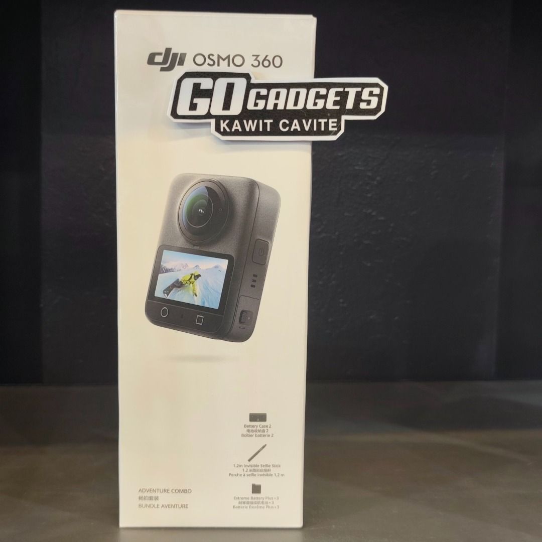 DJI Osmo 360 Adventure Combo (Category: Video Cameras) located in Cavite. Submitted by jerickher83429 (Listing ID 1471016693, Image 1). Description: - Brand: DJI Osmo 360 Action Camera - Version: Adventure Combo (factory sealed with Go Gadgets Kawit Cavite shop sticker) - Included Accessories: Battery Case 2, 1.2m invisible selfie stick, and Extreme Battery Plus - Best For: Travel vlogs, action sports, and immersive video recording - Condition: B