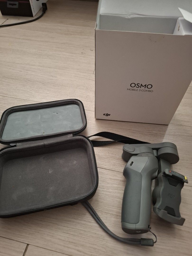 DJI Osmo Mobile 3 Combo (Category: Gimbals & Stabilizers ) located in Paranaque City. Submitted by zendog_be1640 (Listing ID 1470979326, Image 1). Description: - Model: DJI Osmo Mobile 3 Combo (Mobile Gimbal Stabilizer) - Condition: Excellent, securely holds smartphones as pictured - Design: Compact and foldable for easy travel - Controls: Convenient physical buttons on the handle for quick adjustments - Port: Modern USB-C charging port - Inclusi