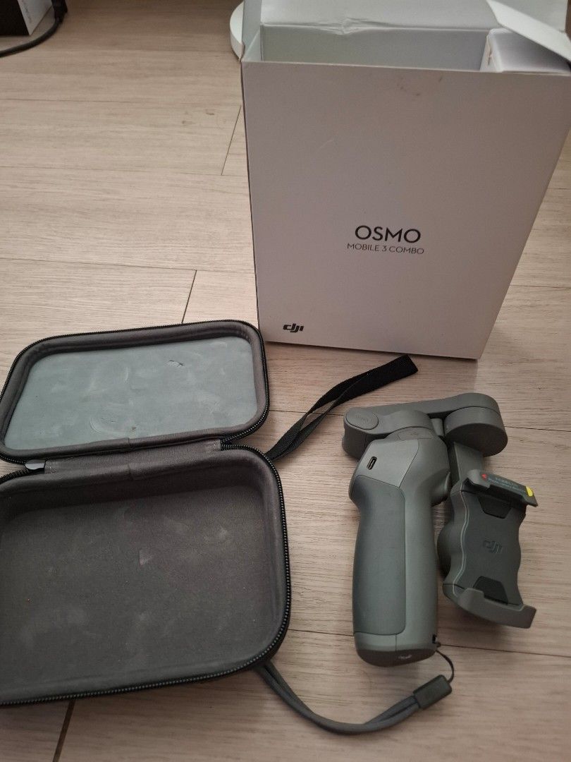 DJI Osmo Mobile 3 Combo (Category: Gimbals & Stabilizers ) located in Paranaque City. Submitted by zendog_be1640 (Listing ID 1470979326, Image 2). Description: - Model: DJI Osmo Mobile 3 Combo (Mobile Gimbal Stabilizer) - Condition: Excellent, securely holds smartphones as pictured - Design: Compact and foldable for easy travel - Controls: Convenient physical buttons on the handle for quick adjustments - Port: Modern USB-C charging port - Inclusi