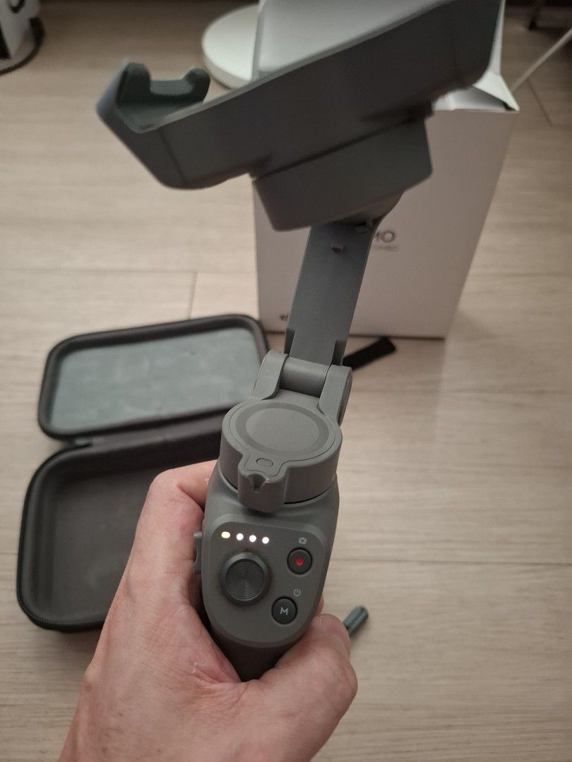 DJI Osmo Mobile 3 Combo (Category: Gimbals & Stabilizers ) located in Paranaque City. Submitted by zendog_be1640 (Listing ID 1470979326, Image 3). Description: - Model: DJI Osmo Mobile 3 Combo (Mobile Gimbal Stabilizer) - Condition: Excellent, securely holds smartphones as pictured - Design: Compact and foldable for easy travel - Controls: Convenient physical buttons on the handle for quick adjustments - Port: Modern USB-C charging port - Inclusi