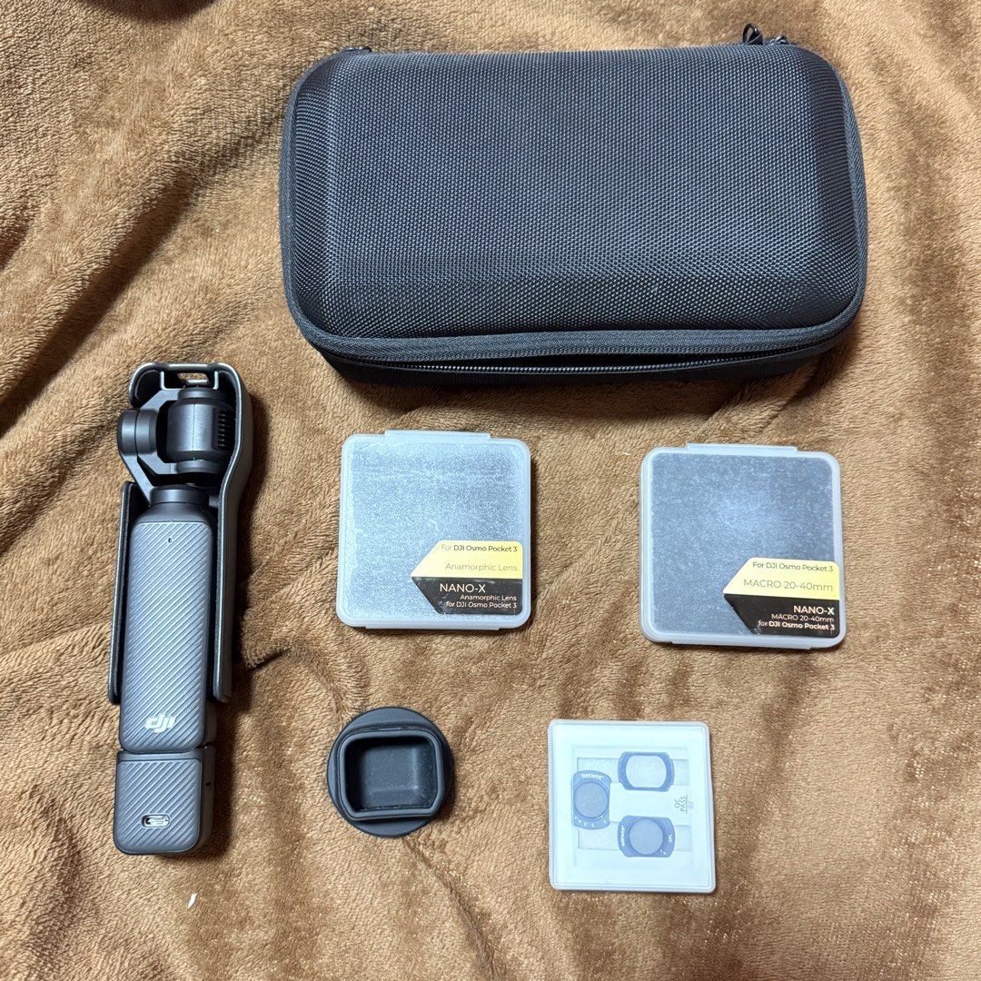 DJI Osmo Pocket 3 (Category: Cameras) located in Cavite. Submitted by vintage.bratz (Listing ID 1471034109, Image 3). Description: • Lady Owned •No functional Issue • With lenses included (Neewer, Macro 20-40mm, Anamorphic Lens…) • + extra freebies and inclusions • Hard case included.